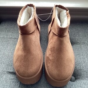 Olivia and Kate flat heel platform booties